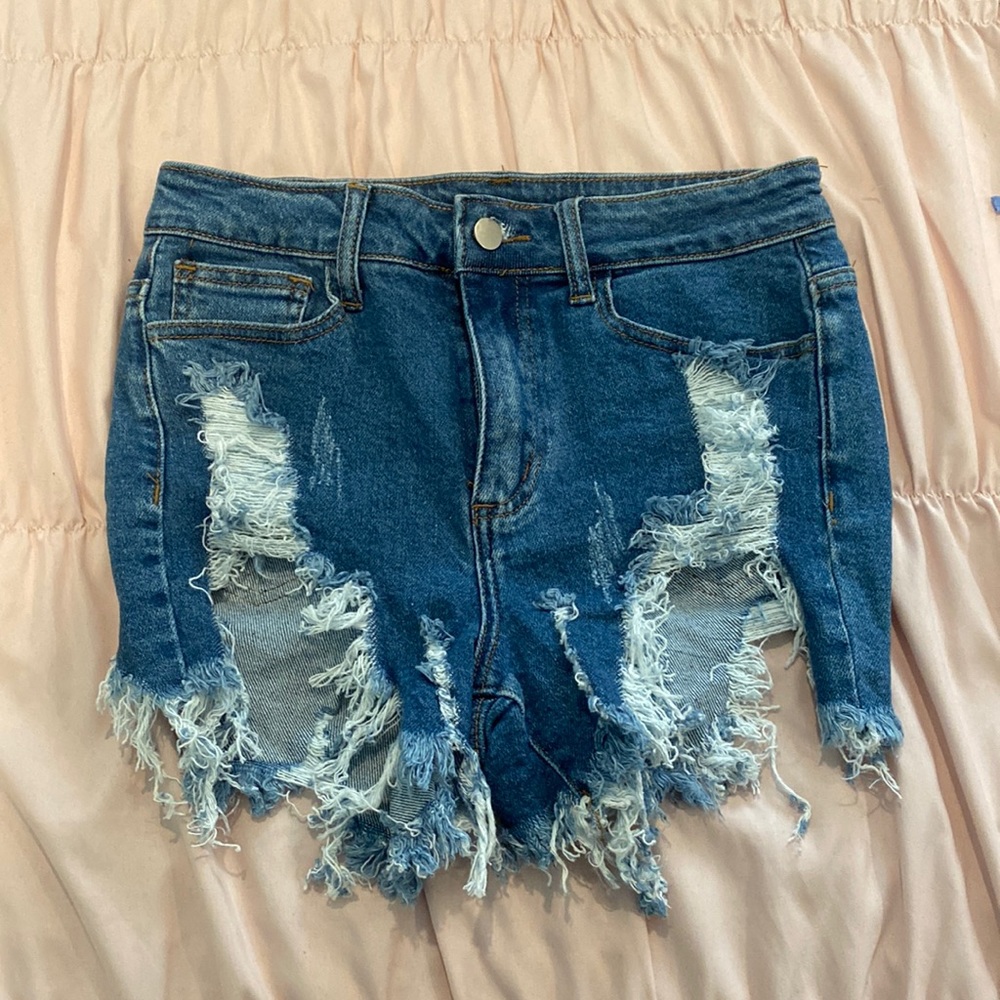 Distressed denim shorts